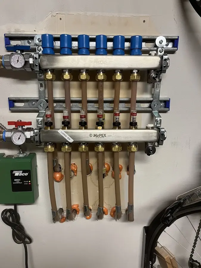 Plumber performing Water Heater Repair at a residential property in Rineyville